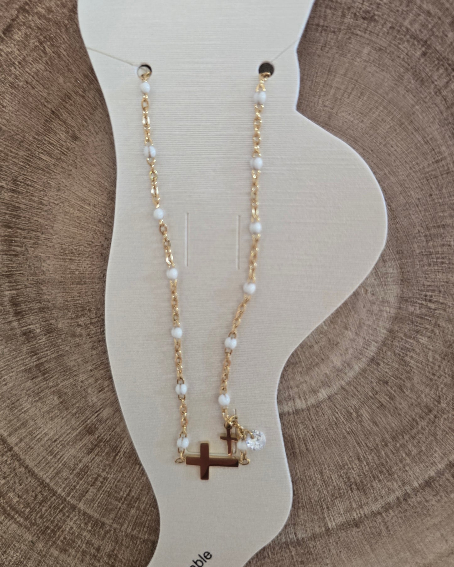 Chaîne de cheville croix blanche